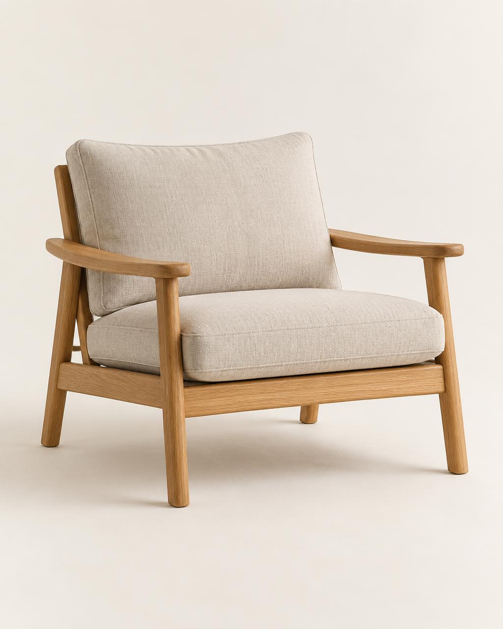 Marlow lounge chair with a solid oak frame and oatmeal linen cushions