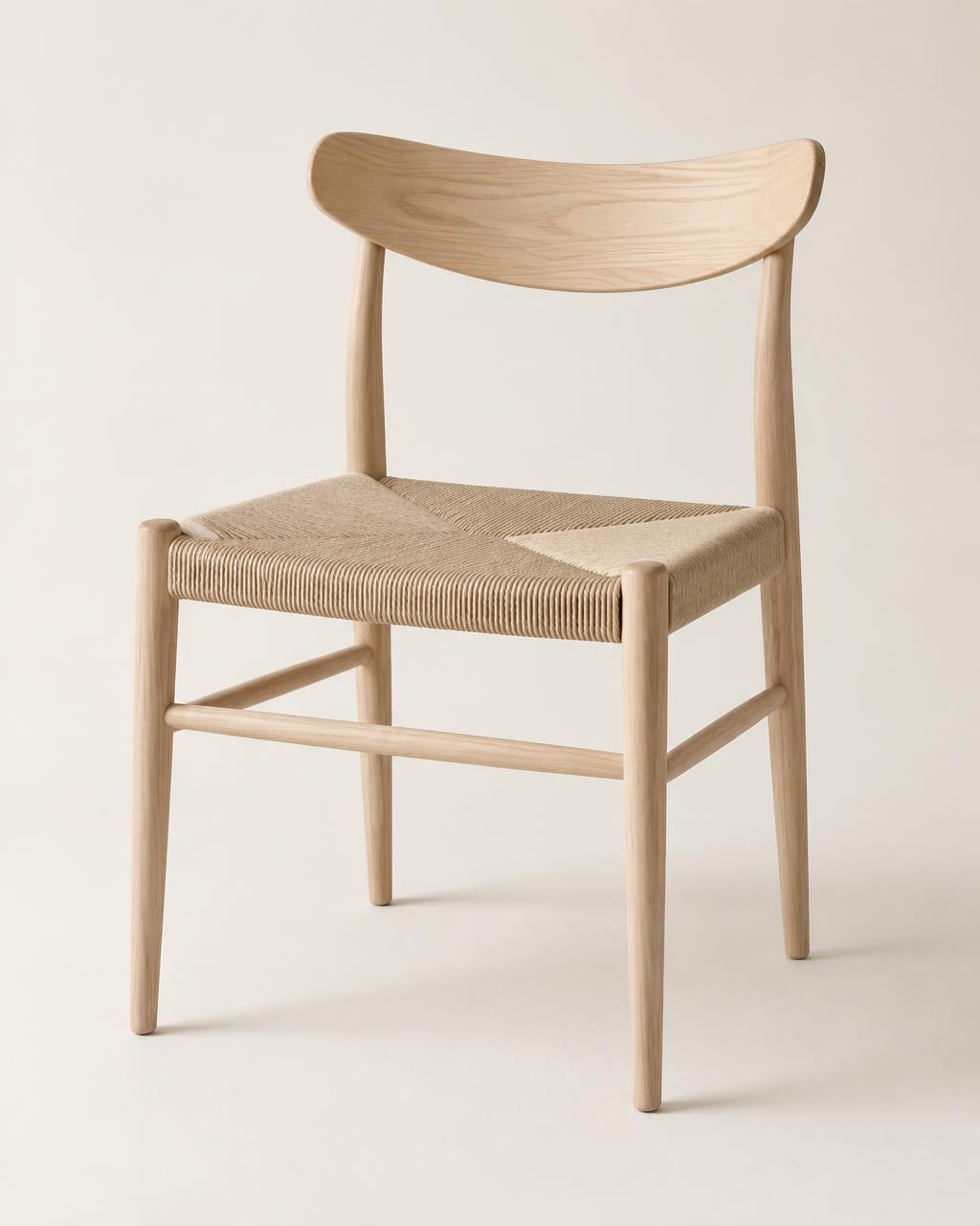 Ridgeway dining chair in pale ash with a woven paper cord seat